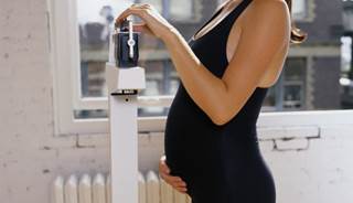 Gestational Weight Gain Lower With Group-Based Intervention Gestational Weight Gain Lower With Group-Based Intervention
